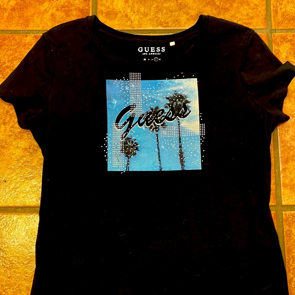 Guess black T-shirt with palm trees and beaded accents. Size L and stretchy